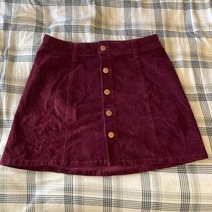 Maroon skirt. Fits size S. Celebrity pink. Stretchy and slimming. Soft fabric.